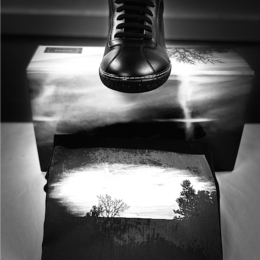 Custom made inspired shoes and tee shirts.